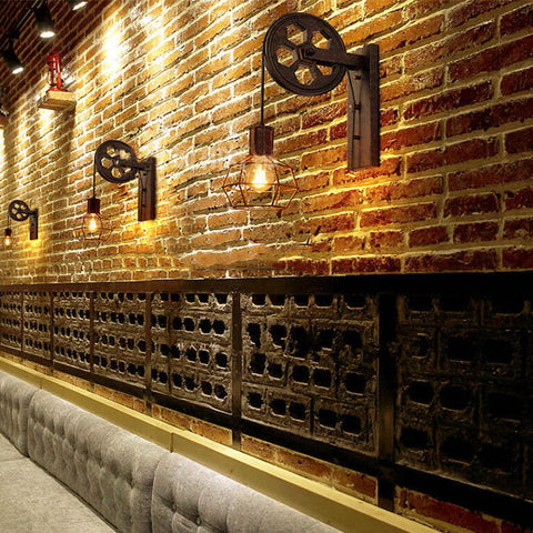Industrial Pulley Wall Sconce with Wood and Iron Details