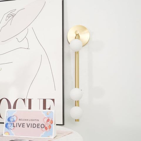 Wall Sconce with Glass Globes and Vertical Brass Tube Frame