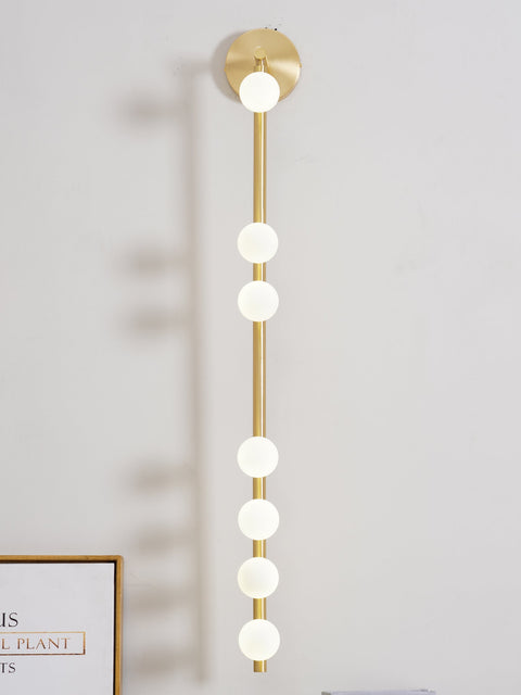 Wall Sconce with Glass Globes and Vertical Brass Tube Frame