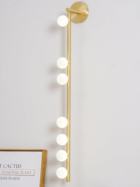 Wall Sconce with Glass Globes and Vertical Brass Tube Frame