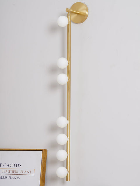 Wall Sconce with Glass Globes and Vertical Brass Tube Frame
