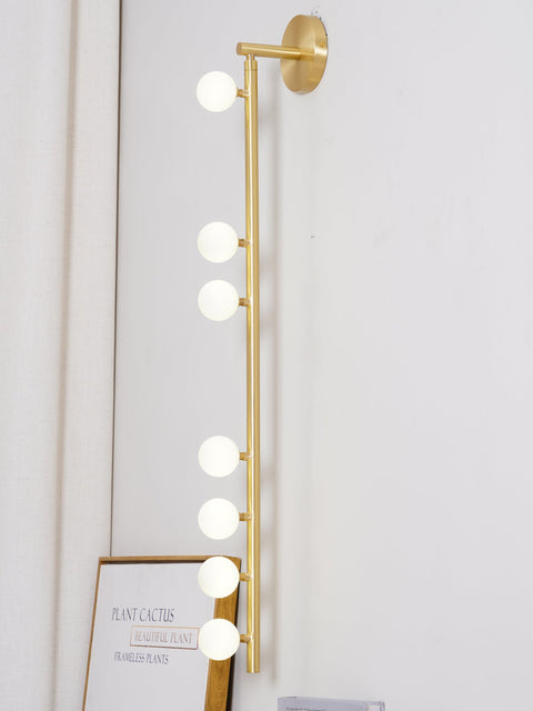 Wall Sconce with Glass Globes and Vertical Brass Tube Frame