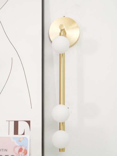 Wall Sconce with Glass Globes and Vertical Brass Tube Frame