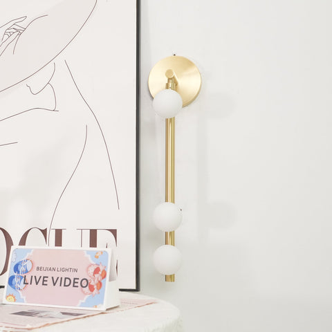 Wall Sconce with Glass Globes and Vertical Brass Tube Frame