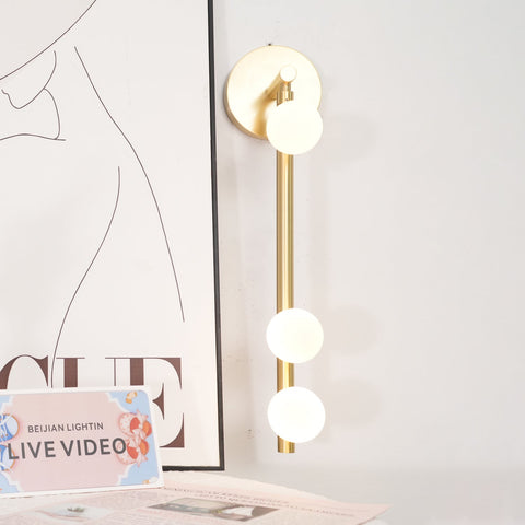 Wall Sconce with Glass Globes and Vertical Brass Tube Frame