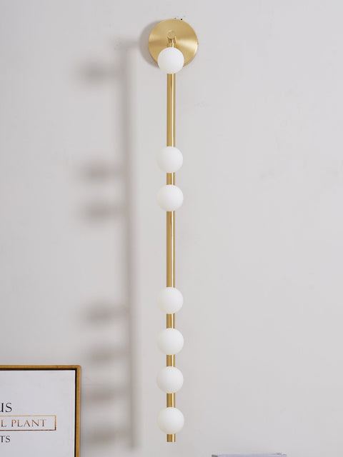 Wall Sconce with Glass Globes and Vertical Brass Tube Frame