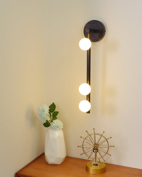 Wall Sconce with Glass Globes and Vertical Brass Tube Frame