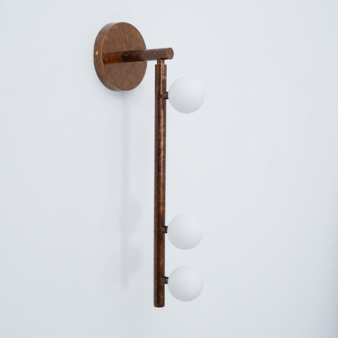 Wall Sconce with Glass Globes and Vertical Brass Tube Frame
