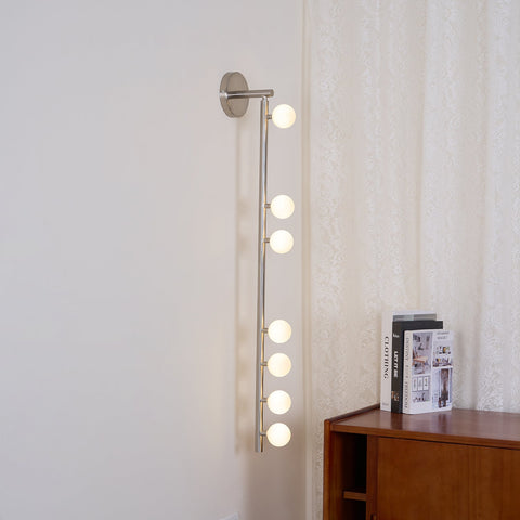 Wall Sconce with Glass Globes and Vertical Brass Tube Frame