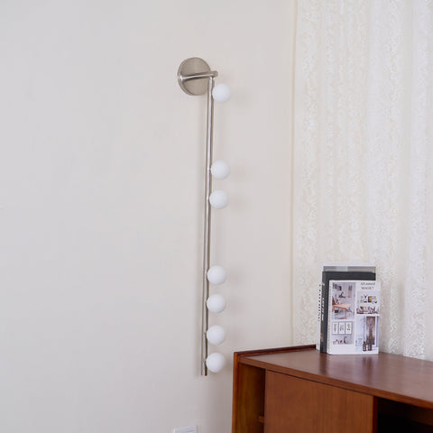 Wall Sconce with Glass Globes and Vertical Brass Tube Frame