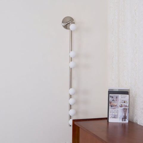 Wall Sconce with Glass Globes and Vertical Brass Tube Frame