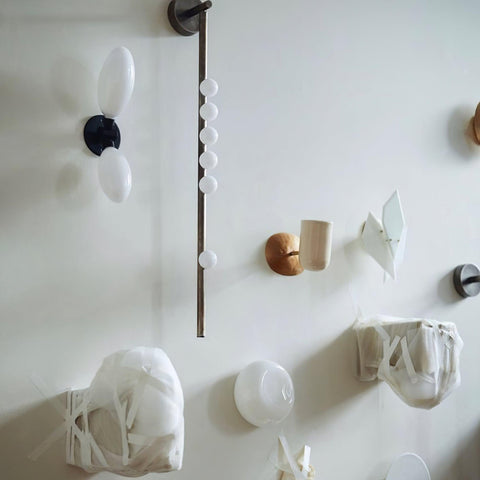 Wall Sconce with Glass Globes and Vertical Brass Tube Frame