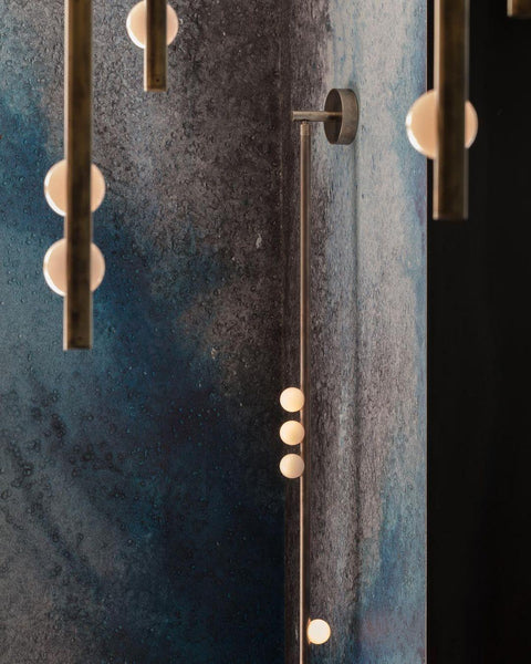 Wall Sconce with Glass Globes and Vertical Brass Tube Frame