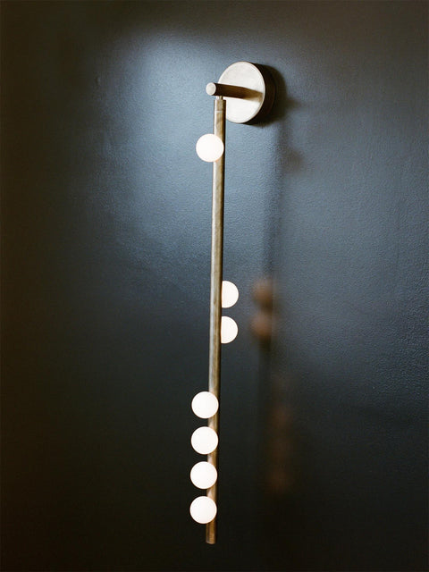 Wall Sconce with Glass Globes and Vertical Brass Tube Frame