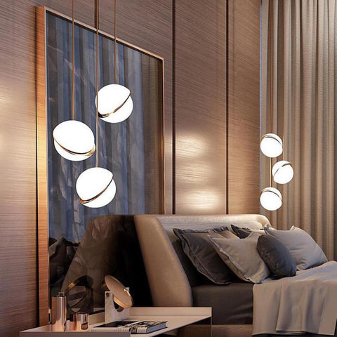 Pendant Light with Acrylic Globe and Curved Brass Crescent Detail