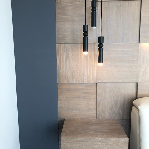 Pendant Light with Metal Cylinders and Decorative Sphere Detail