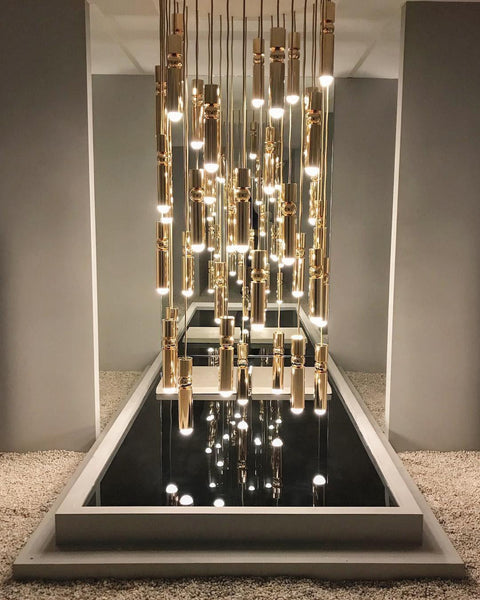 Pendant Light with Metal Cylinders and Decorative Sphere Detail