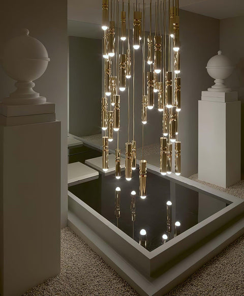Pendant Light with Metal Cylinders and Decorative Sphere Detail