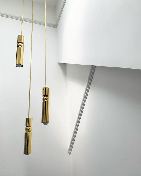 Pendant Light with Metal Cylinders and Decorative Sphere Detail