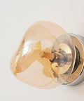 Glass Wall Sconce with Metal Frame and Sculptural Shade — product view