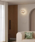 Glass Wall Sconce with Metal Frame and Sculptural Shade — product view