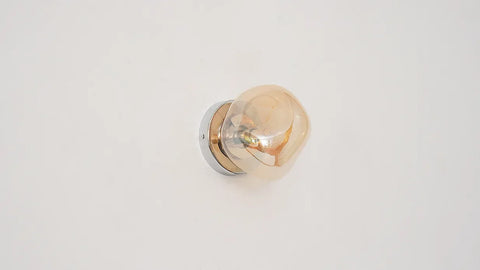 Glass Wall Sconce with Metal Frame and Sculptural Shade — product view