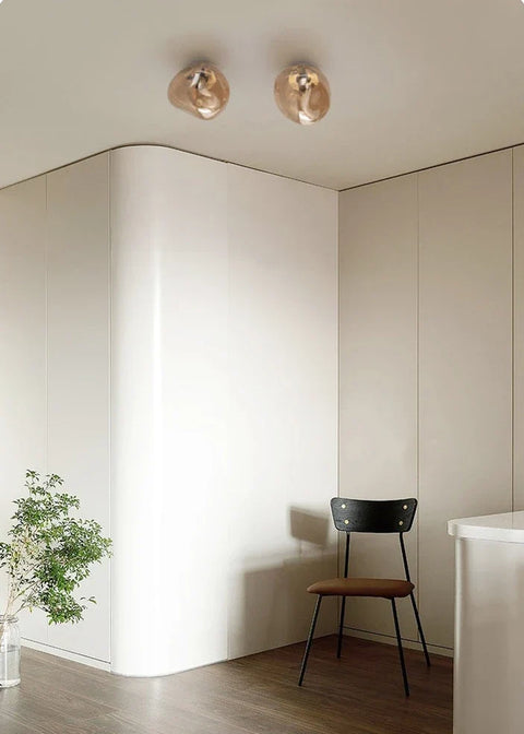 Glass Wall Sconce with Metal Frame and Sculptural Shade — product view