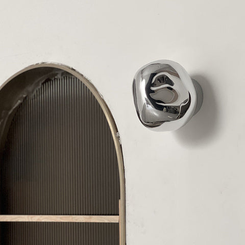 Glass Wall Sconce with Metal Frame and Sculptural Shade — product view