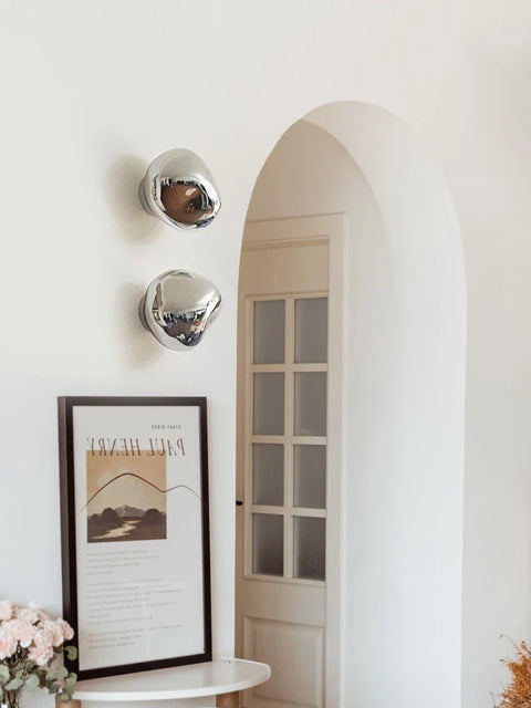 Glass Wall Sconce with Metal Frame and Sculptural Shade — product view