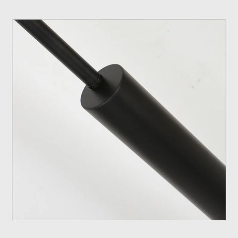 Minimalist Black Floor Lamp with Slim Black Pole and Shade in Metal