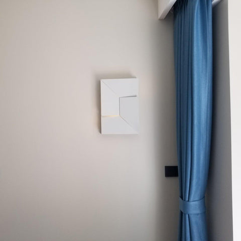 Wall Light with Geometric Aluminum Relief and Integrated LED