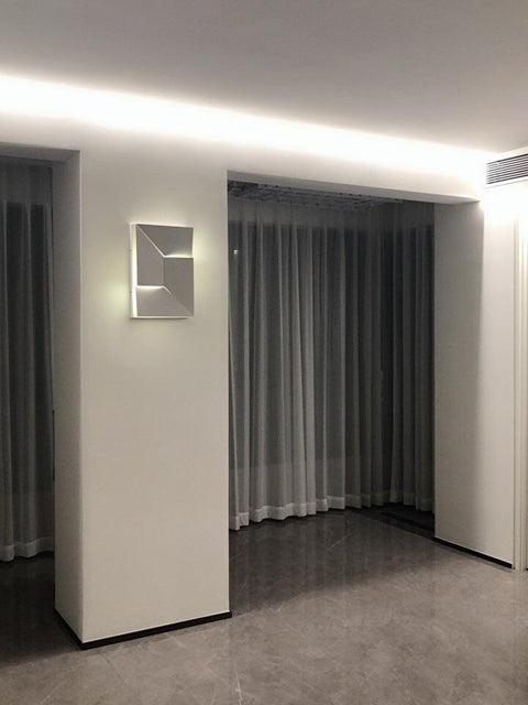 Wall Light with Geometric Aluminum Relief and Integrated LED