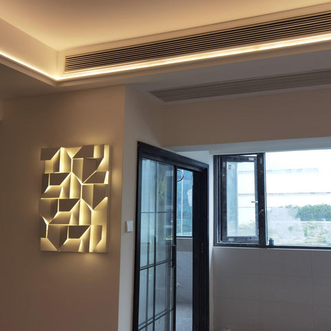 Wall Light with Geometric Aluminum Relief and Integrated LED