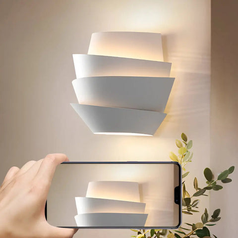 Layered Metal Wall Sconce with Up and Down Lighting for Indoor Spaces