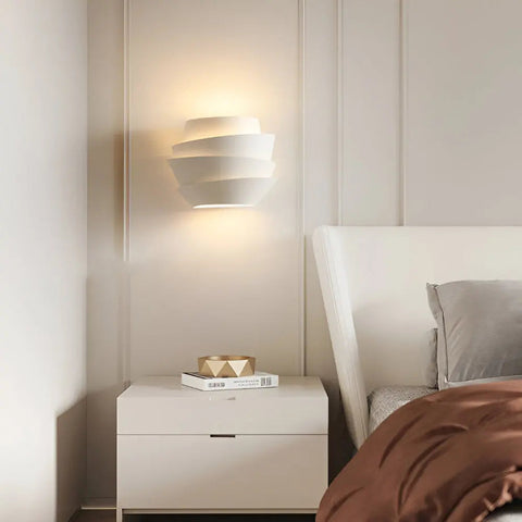 Layered Metal Wall Sconce with Up and Down Lighting for Indoor Spaces