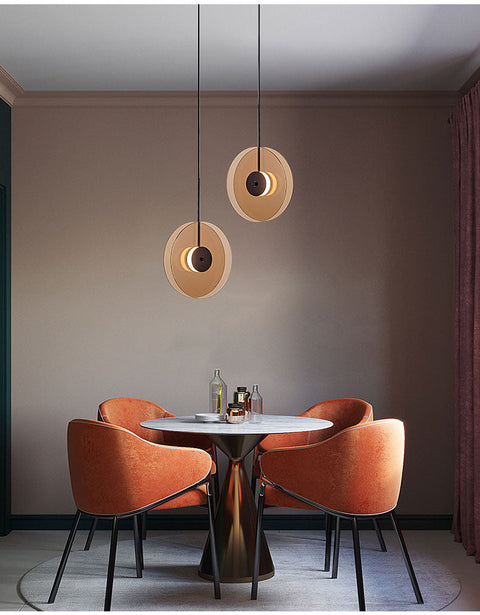LED Pendant Light with Layered Glass Discs and Warm Ambient Lighting
