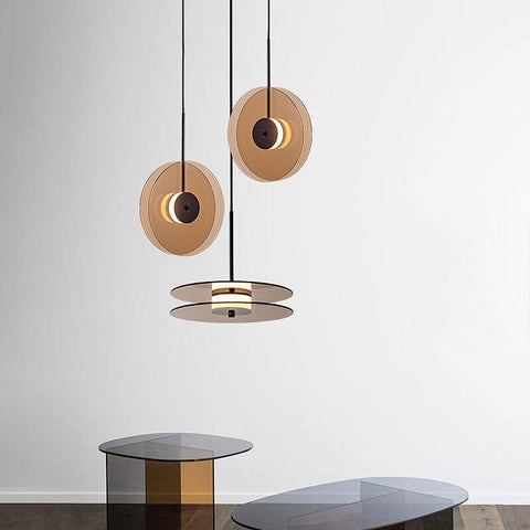 LED Pendant Light with Layered Glass Discs and Warm Ambient Lighting